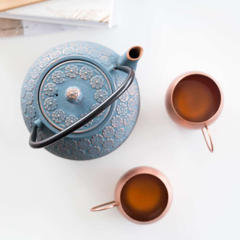 tea kettle and copper cups - feng shui changing bad money luck