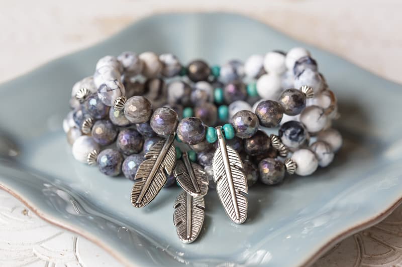 crystal bracelets on blue dish