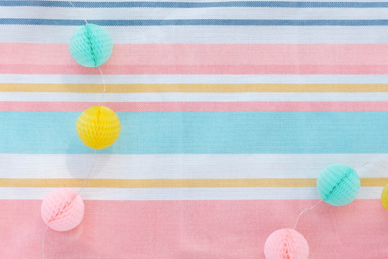 colorful garland on beach towel