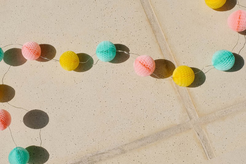 colorful string of garland on tile