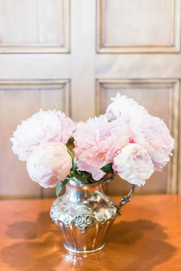 vase full of pink peonies