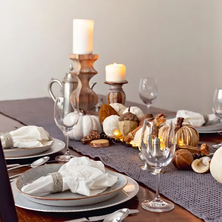 dining table set with fall decor items