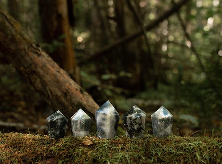 moss agate towers in a forest