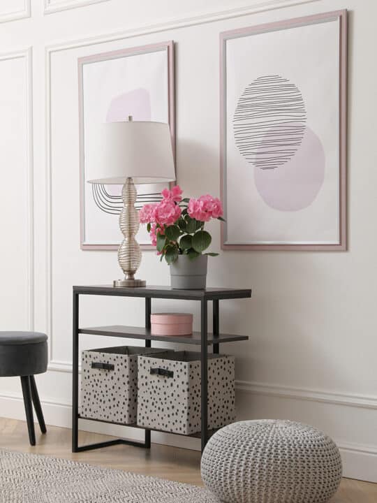 feng shui entryway decor ideas - table with flowers, artwork, and lamp