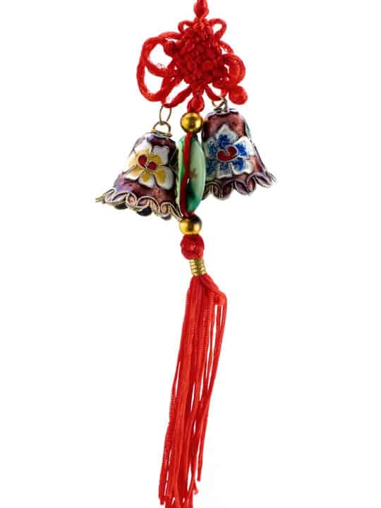colorful bells with red string