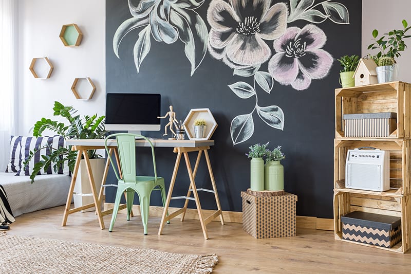 desk area with chalkboard art on wall and cute decor