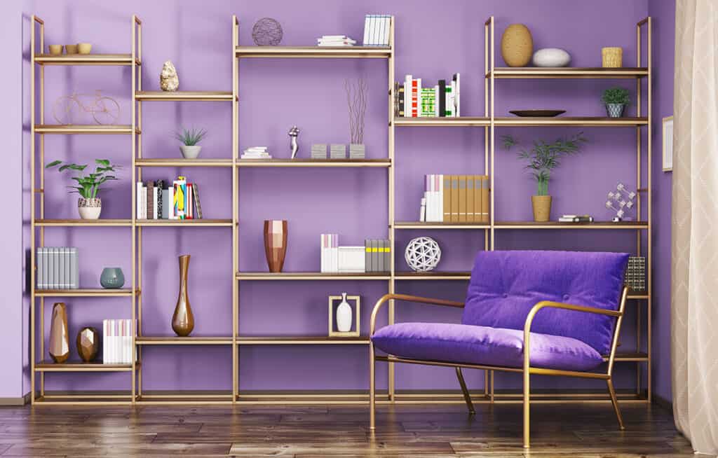 living room with purple accent wall and purple chair