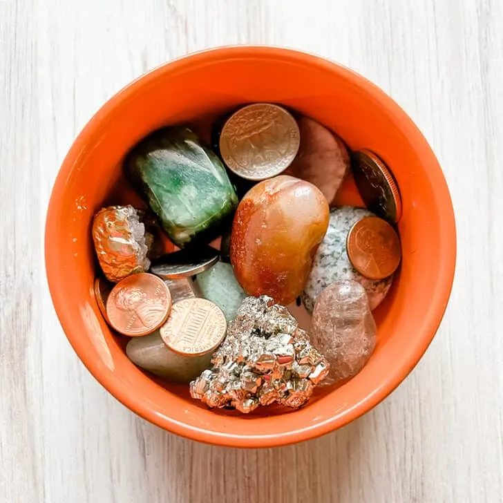 feng shui wealth bowl with crystals and money