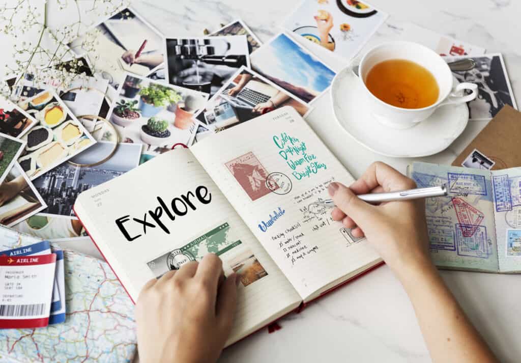 gathering pictures and brainstorming ideas in a notebook