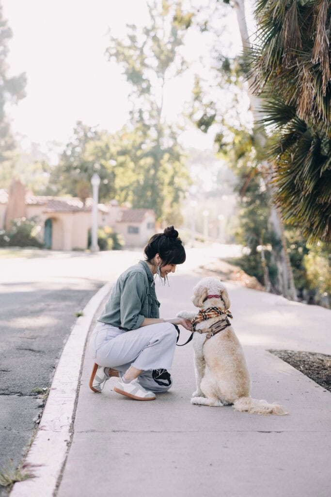 woman outside with her dog